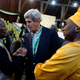 Former U.S. Secretary of State John Kerry and former South Africa President Thabo Mbeki, observers for the general election in Kenya, greet each other next to former Senegalese Prime Minister Aminata Toure in a tally centre in Nairobi, Kenya.